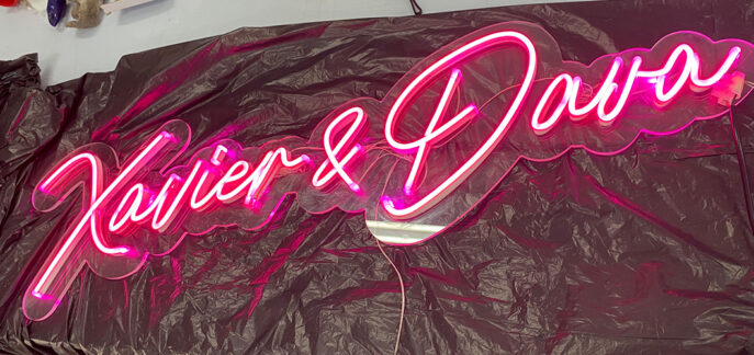 pink letters neon sign