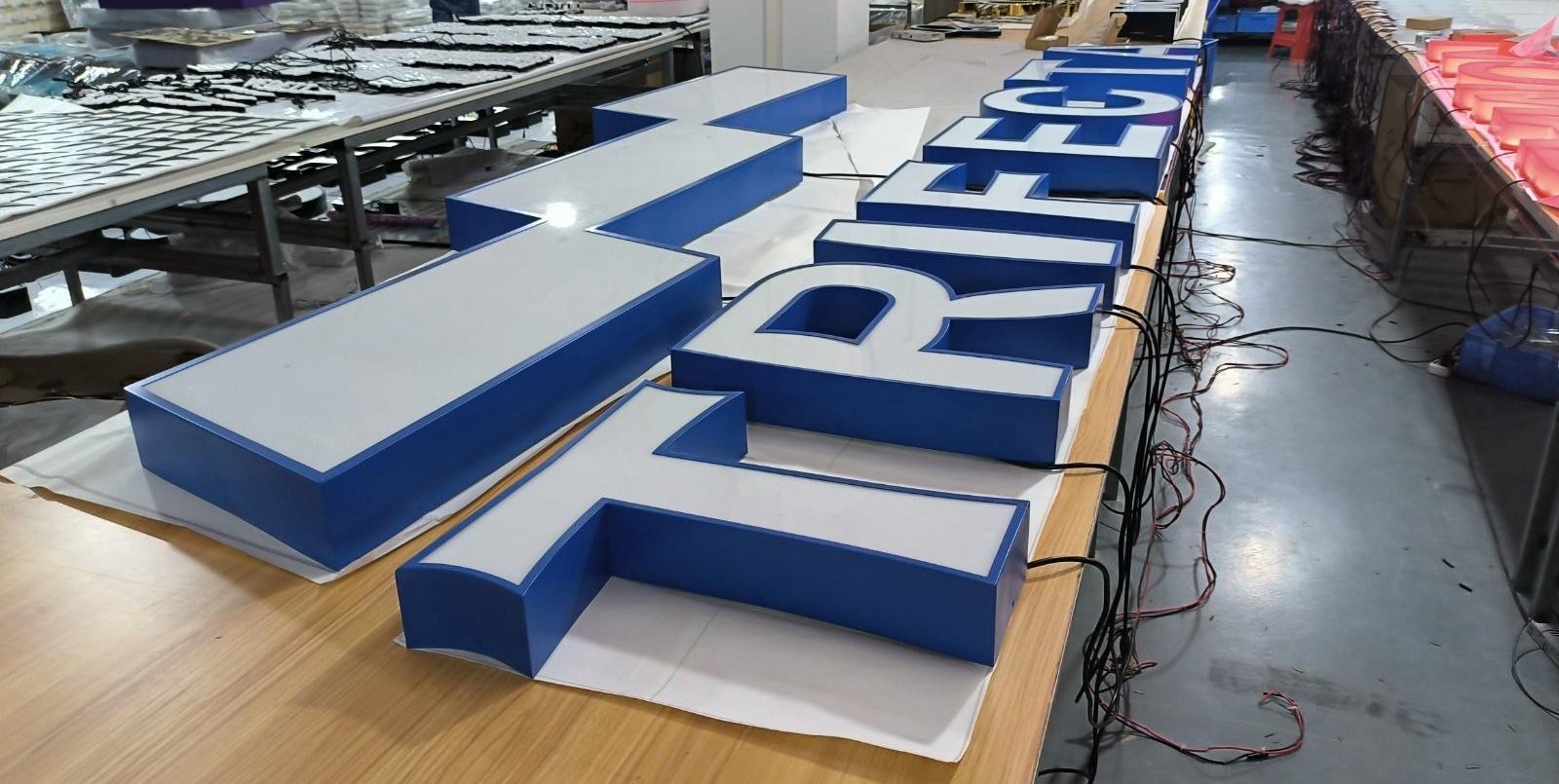 Trifecta building signage