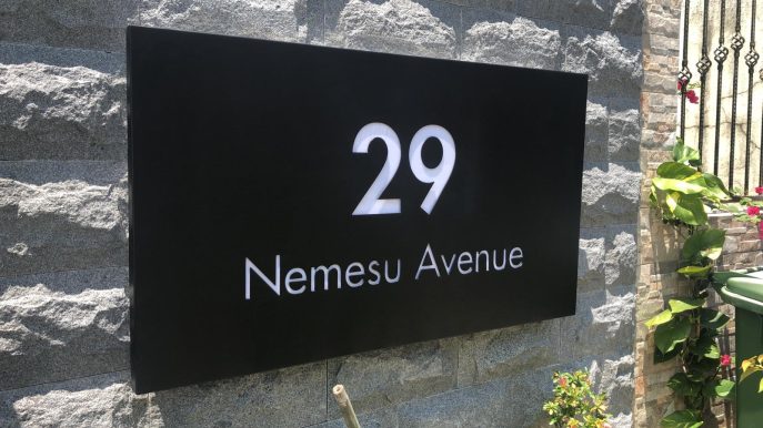 Lighted house number signage