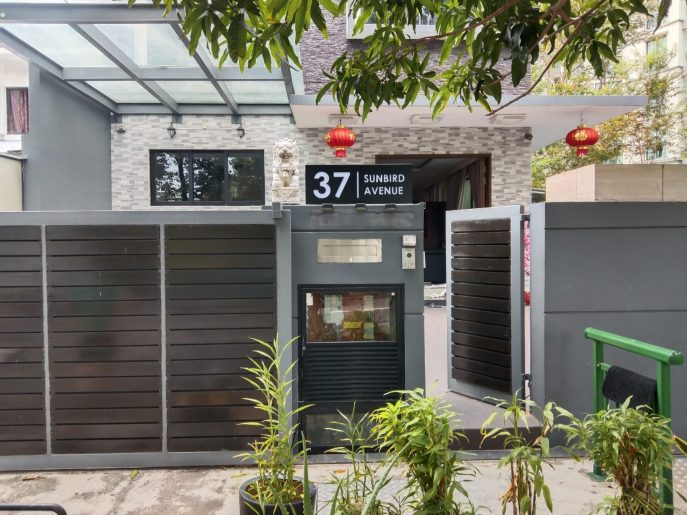 Gold metal landed house sign