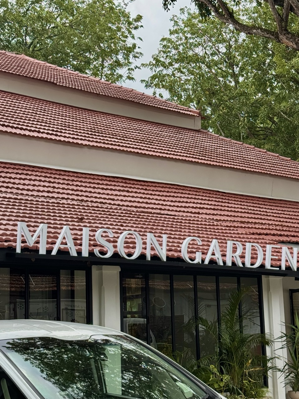Maison Garden main entrance signage