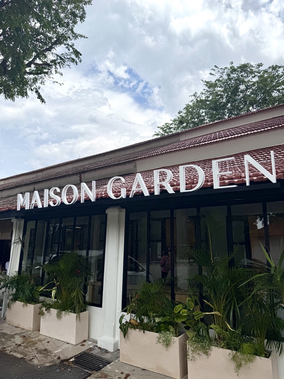 Maison Garden main entrance signage