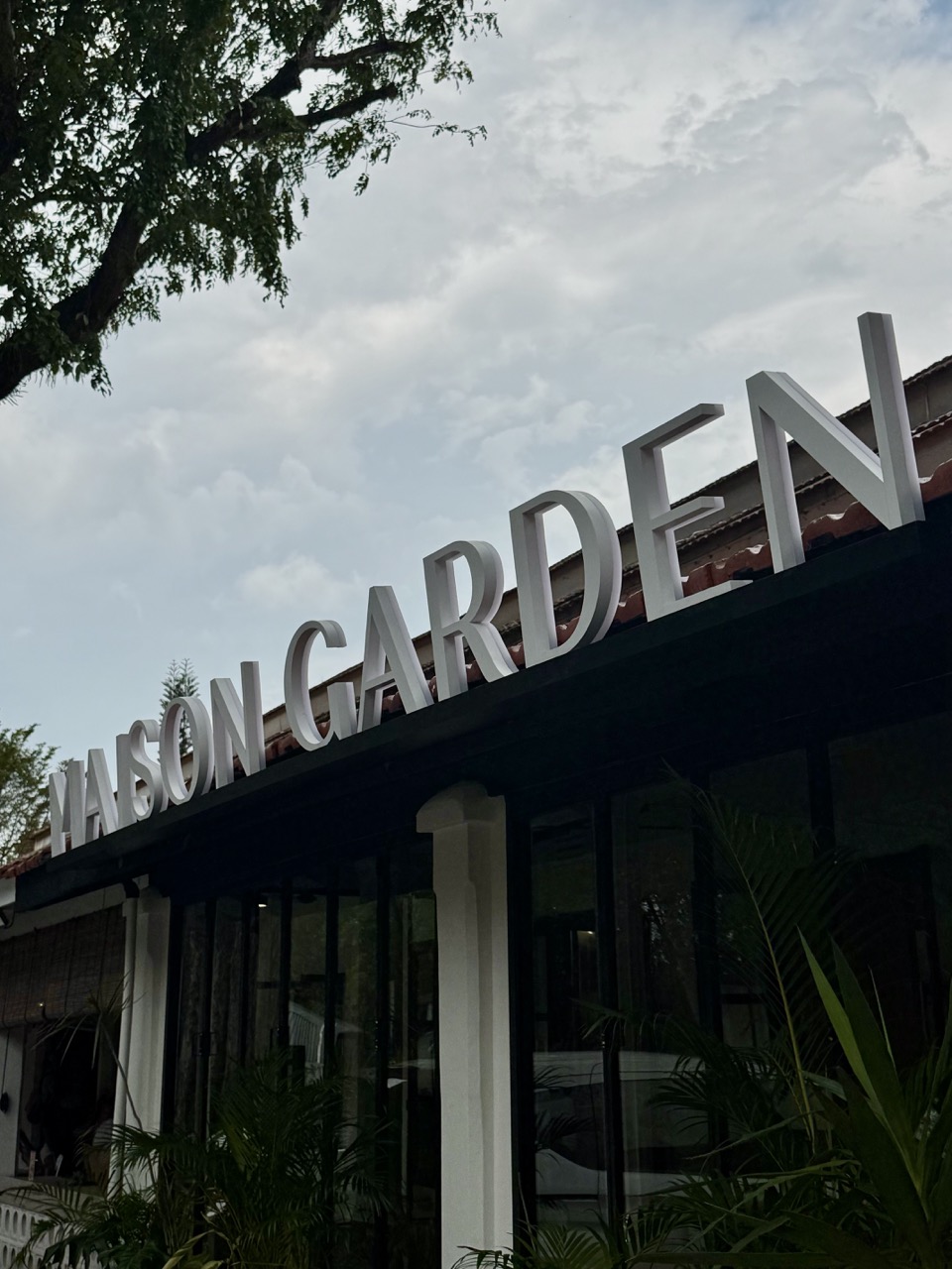 Maison Garden main entrance signage