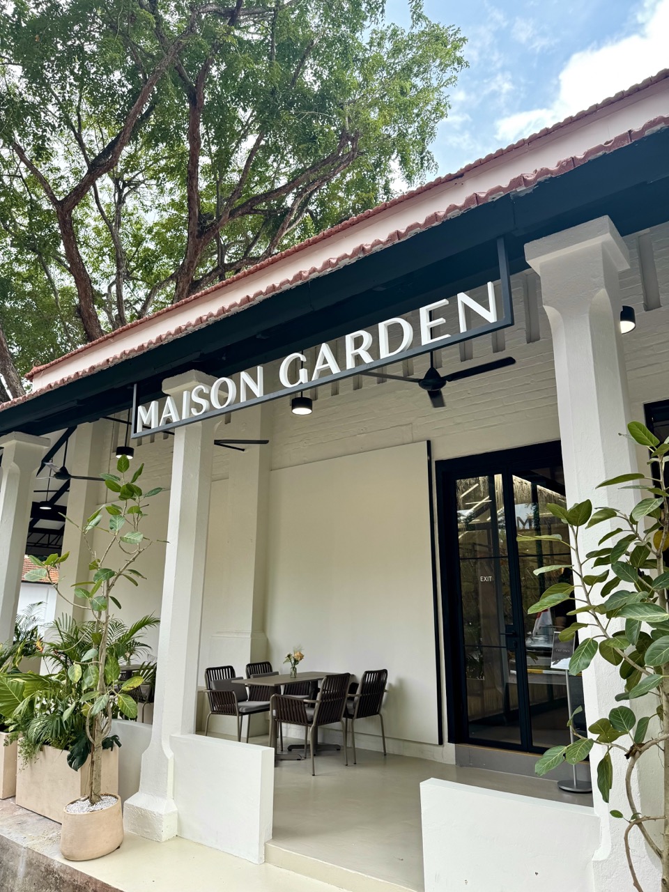 Maison Garden main entrance signage