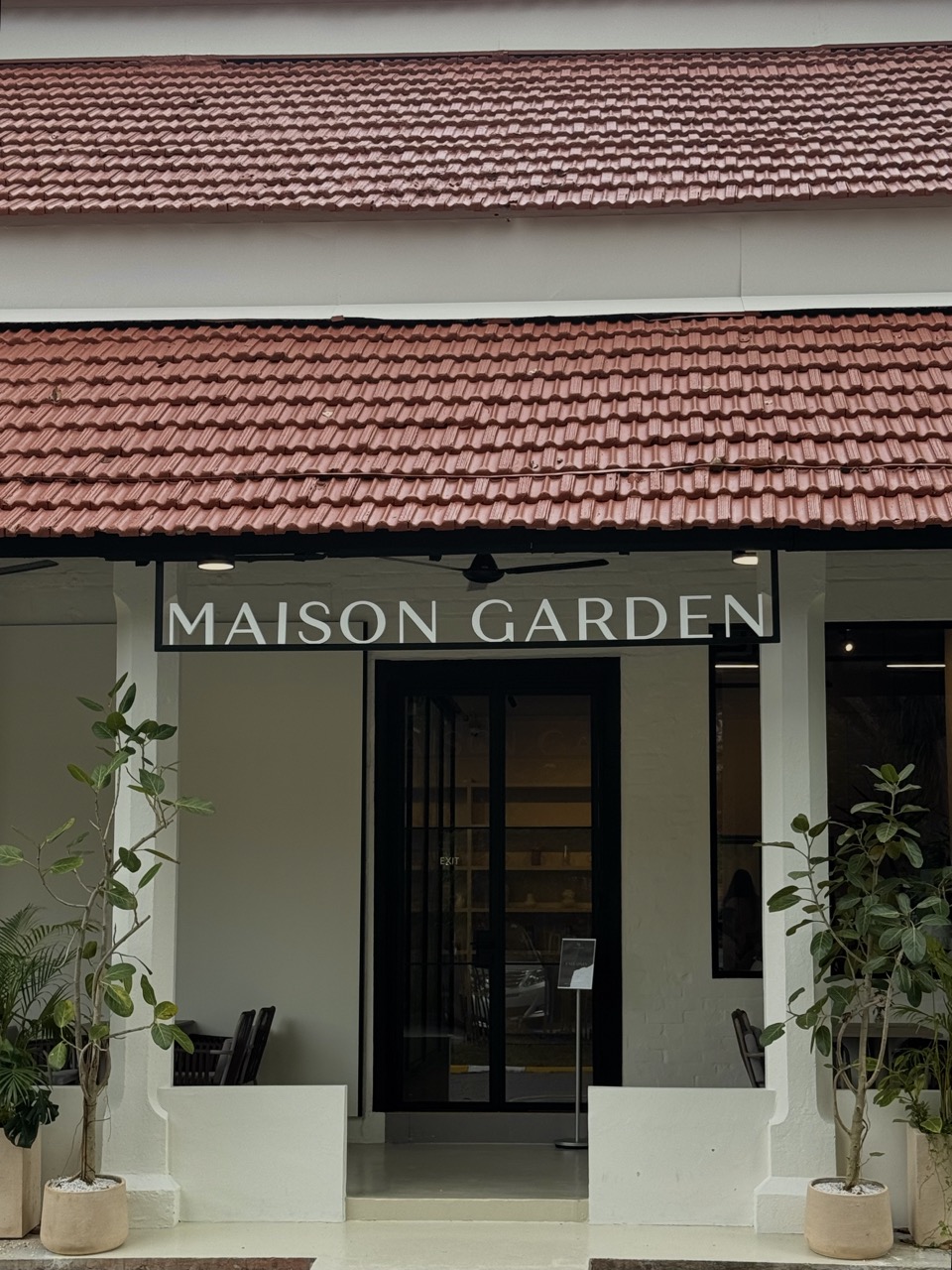 Maison Garden main entrance signage