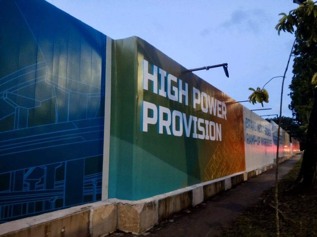 Hoarding vinyl prints installation at 2 Clementi Loop